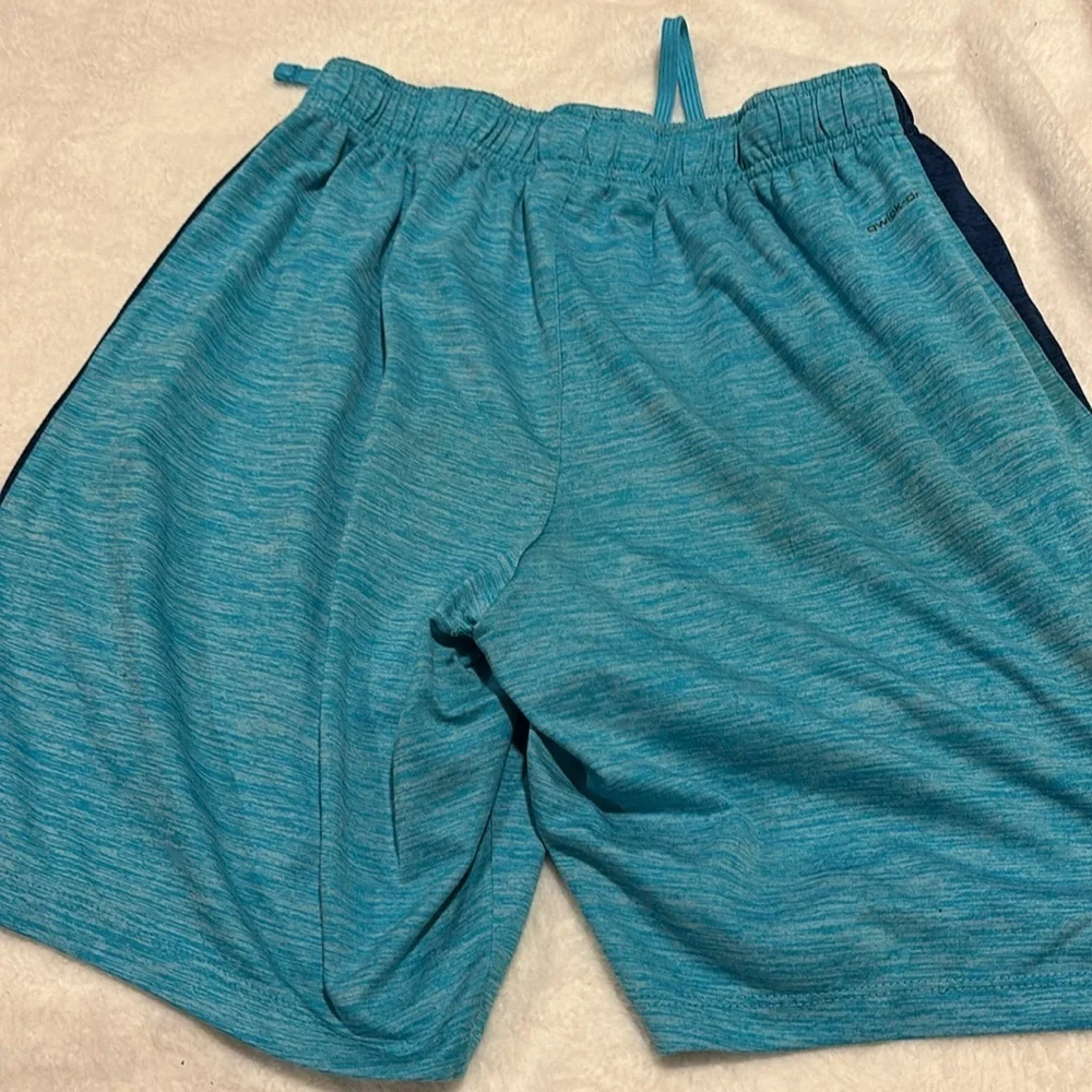 Boys quick dry mesh athletic shorts light blue and dark blue. Ties at waist
